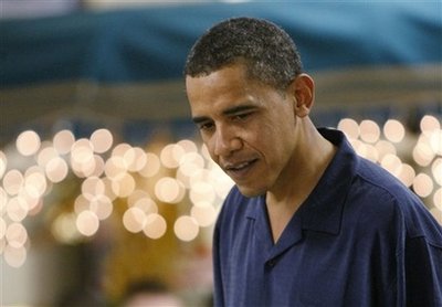 President-elect Barack Obama greets soldiers as they eat Christmas dinner at Marine Corp Base Hawaii in Kailua, Hawaii Thursday, Dec. 25, 2008.  (AP Photo/Gerald Herbert)